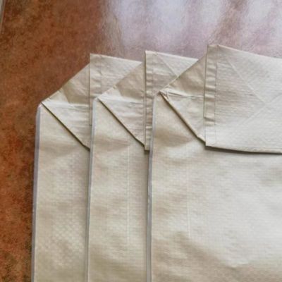 50x60x11cm 85GSM ((65GSM+20GSM) সিমেন্ট বিল্ডিং উপাদান পূরণের জন্য প্লাস্টিকের প্যাকেজিং ব্যাগ